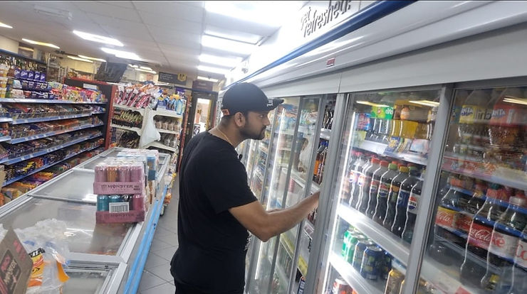 Store owner taking stock